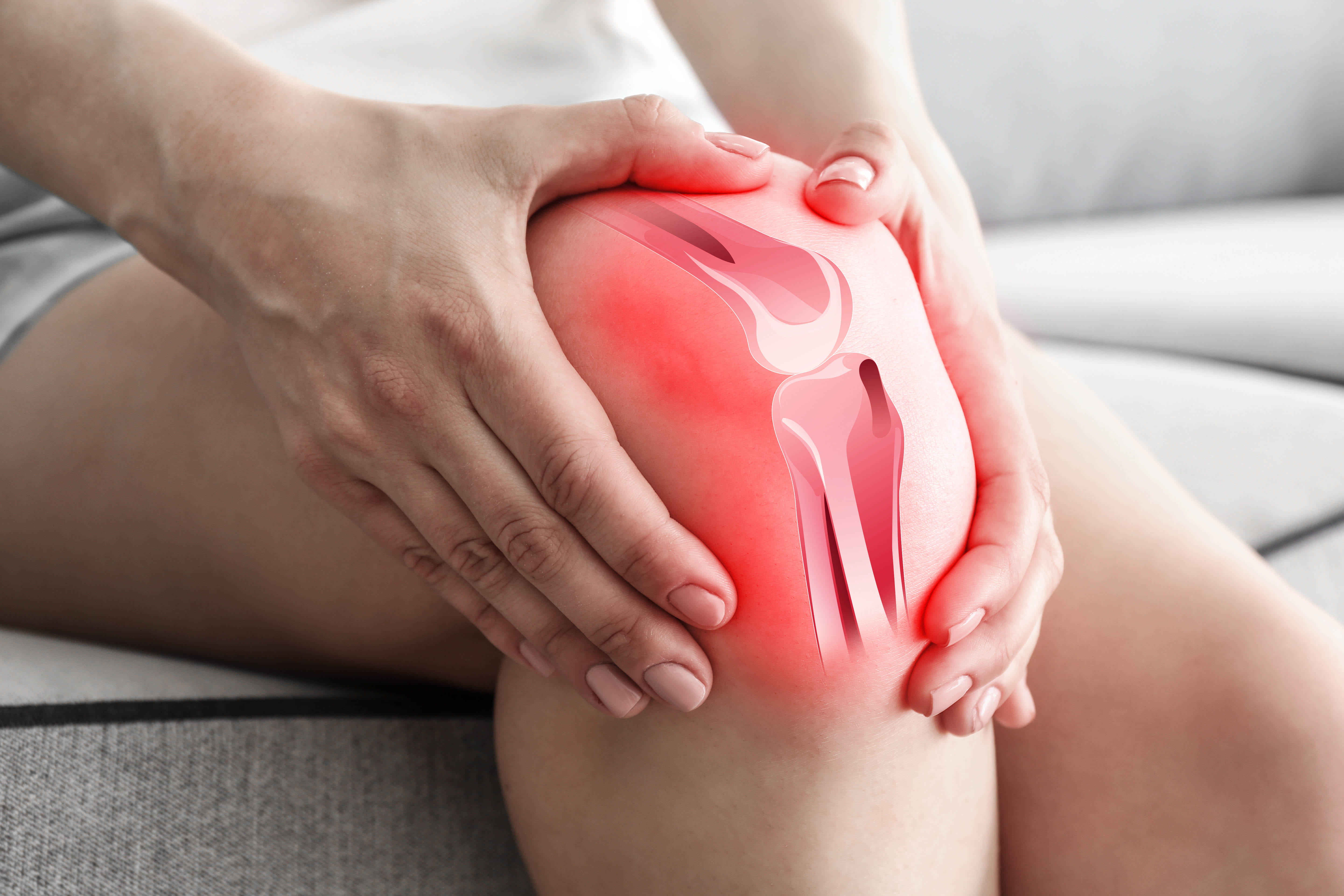 Close-up illustration of joint inflammation in the knee, representing the acute and chronic pain conditions treated with Summus Class IV Laser photobiomodulation therapy at the TAC Sport Medicine Clinic